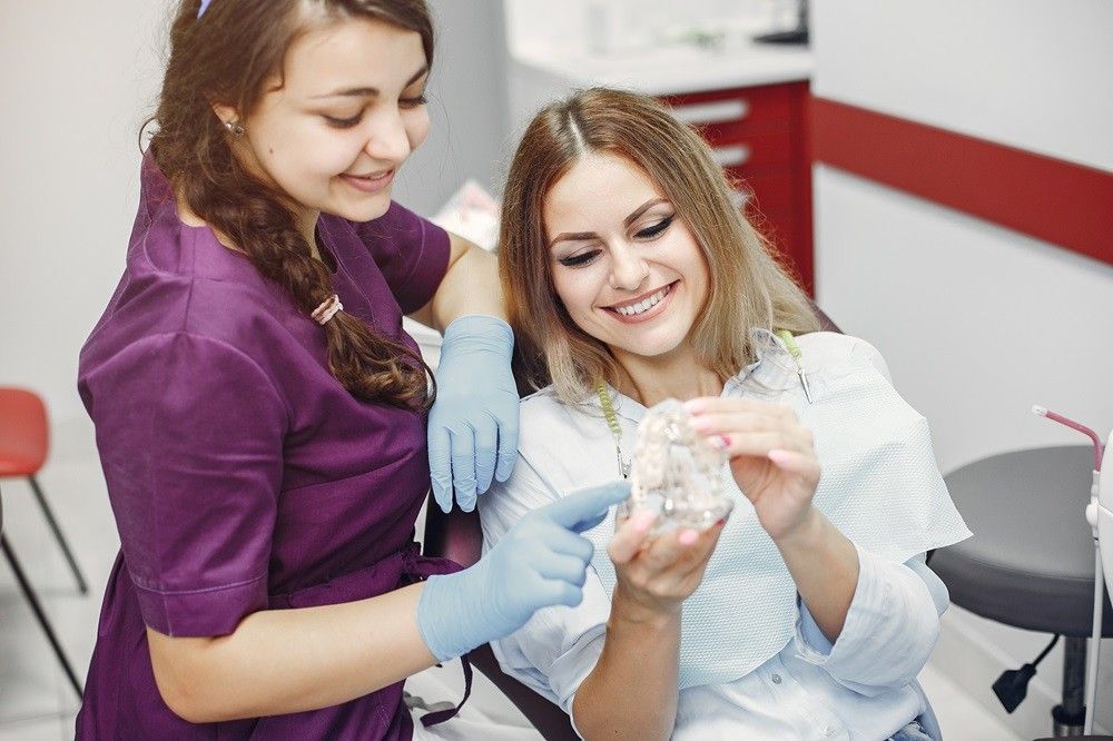 Preventive Care Tips For People With Braces, Implants, Or Dentures